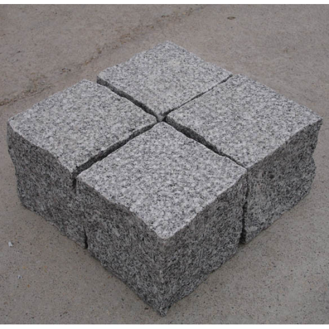 Grey granite cobblestone driveway pavement
